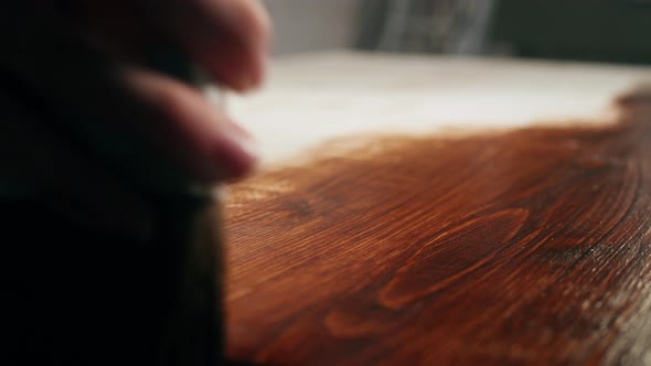 Varnishing Wooden Table Closeup