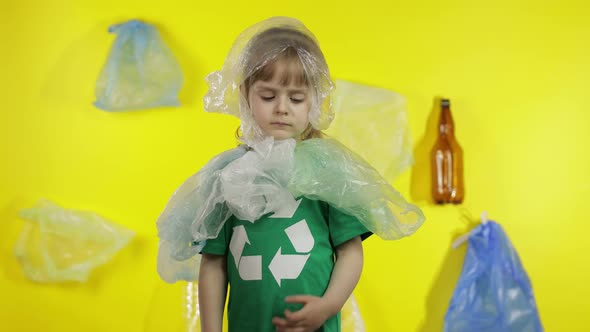 Girl Volunteer in Plastic Packages on Her Neck and Head. Reduce Plastic Pollution. Save Ecology
