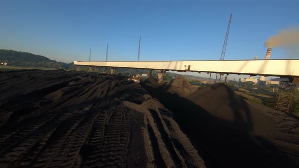 FPV Drone View Flight Over Coal Delivery Terminal with Port Cranes for Thermal Power Plant at