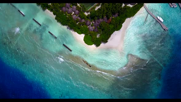 Aerial drone view abstract of luxury seashore beach adventure by blue ocean and white sand backgroun