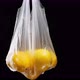 Ripe yellow lemons lie in a transparent plastic bag - VideoHive Item for Sale