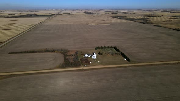 Aerial footage from high above St Boniface Church in Flagstaff County, Alberta. Slow circling camera