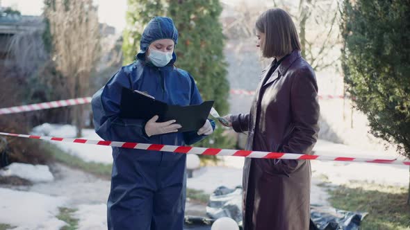 Private Detective Paying for Information to Forensics Scientist at Crime Scene