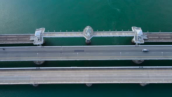 Aerial view top down view Sarasin Phuket Bridge transport over sea. Transport concept.