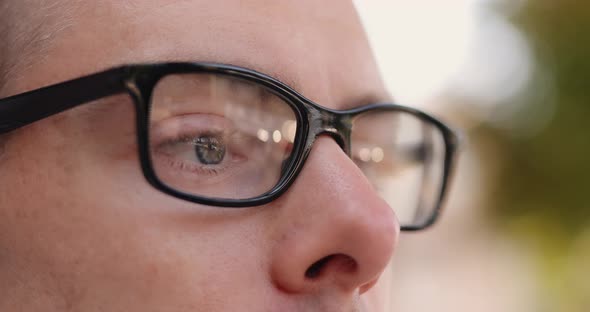 Closeup Male Eyes Looking Through Optical Eyeglasses
