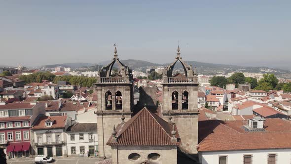 Flying forward Braga Historic Cathedral Beatiful bell towers at City Centre - Portugal