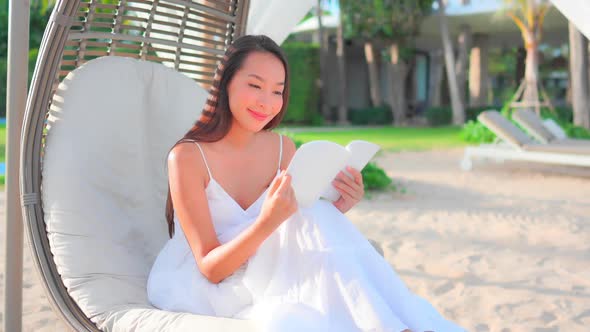 Young asian woman read book