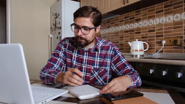 Smiling Hipster Male Student Wear Glasses Elearning Study with Online