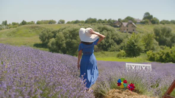 Healthy Woman Runs Joyfully Through Lavender Field