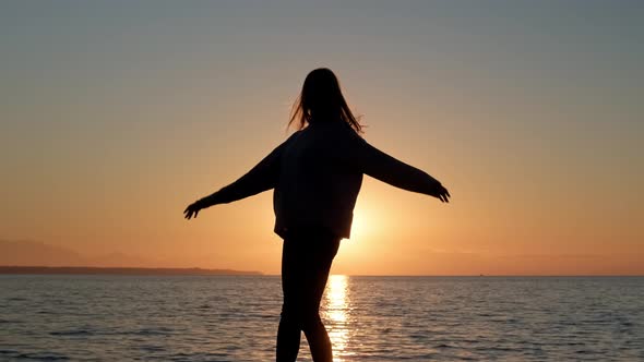 Silhouette of Young Woman