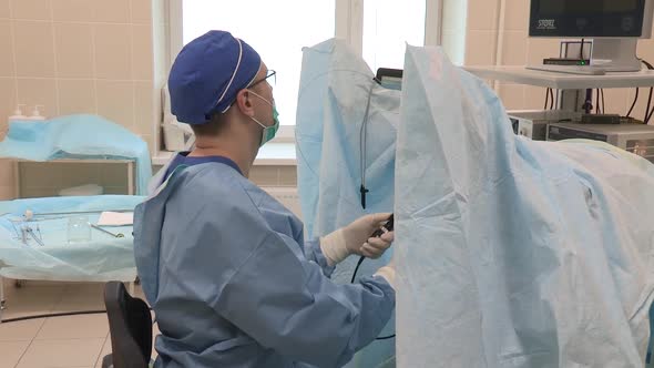 Doctor Video Footage - A Medical Practitioner Doing A Medical Procedure Using A Modern Equipment