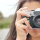 Attractive Girl Takes Pictures on the Retro Camera - VideoHive Item for Sale