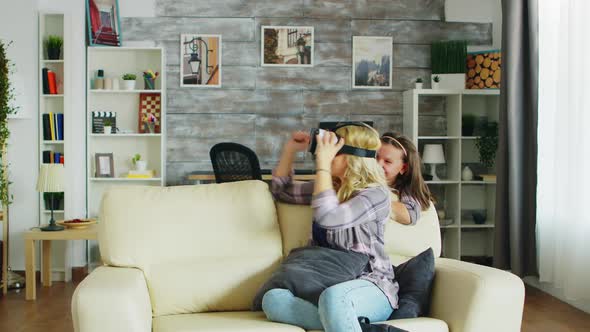 Little Girl Jumping Around Her Mother