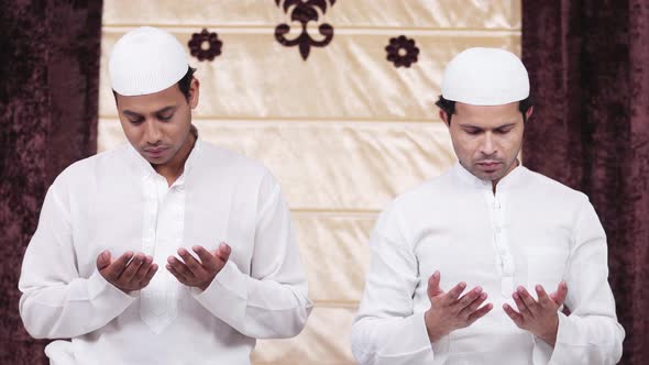 Muslim men reading Namaz