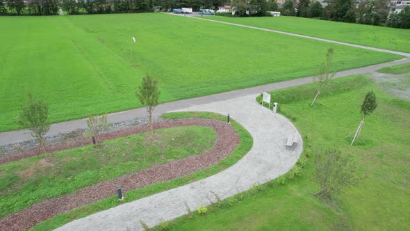 Playground for Children in Liechtenstein Among the Mountain Valley Aerial Vew