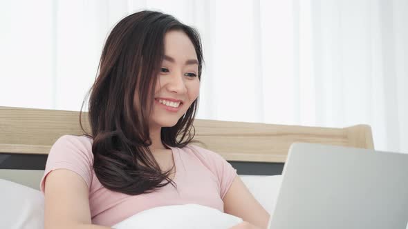 Woman using laptop computer shopping online