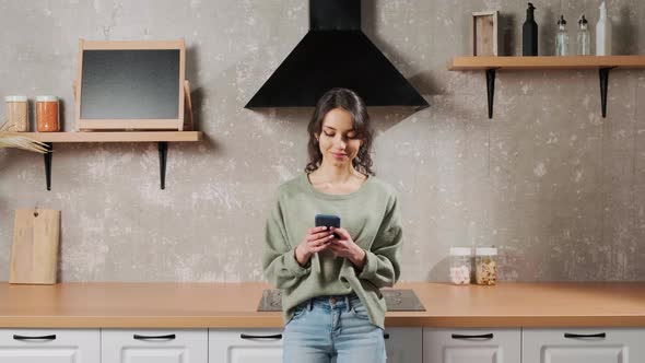 Woman Holding Smartphone and Type a Message Chating in Social Media