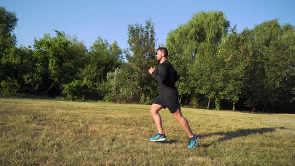 Sport Man Running at Sunset