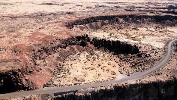 Slow panoramic aerial of Frenchman's Coulee near the Columbia River gorge