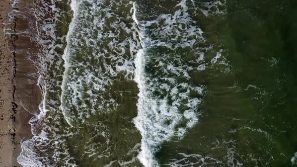 Aerial Drone View Flight Over Beautiful Sea Waves on Sand Beach with White Foam
