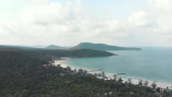 Exotic Paradisiac landscape bordering the calm turquoise ocean in Saracen Bay, Koh Rong Sanloem 4K