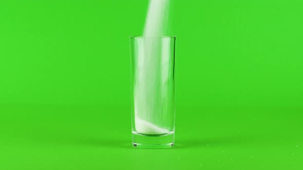 Pour Sugar Highball Glass Thick Bottom Green Contrasting Background. Concept