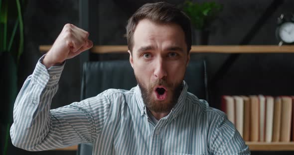 Happy Bearded Business Man Showing Yeah Gesture of Victory He Achieved Result Goals at Modern Office