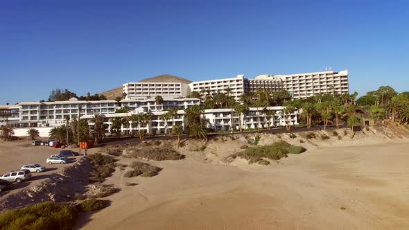 Aerial view of buildings in front of the beach at Sotavento lagoon beach.