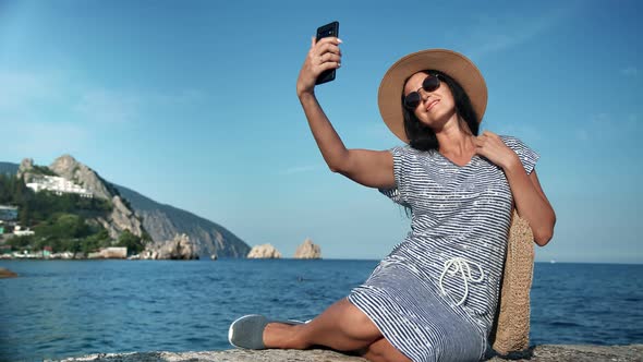Fashion Tourist Woman Posing Taking Selfie on Seaside Use Smartphone