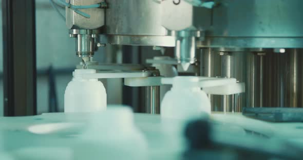 chemical bottles in a production line