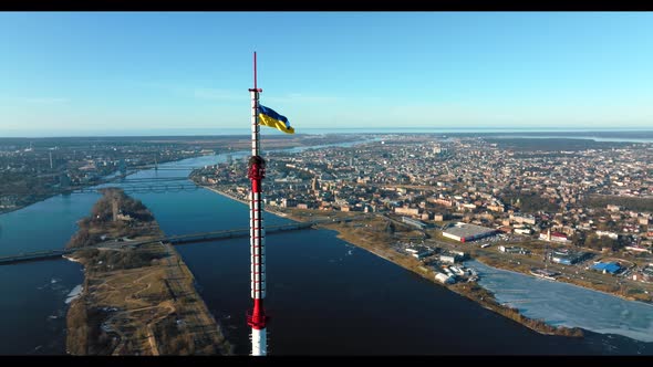 Ukrainian Flag Waving on Top of the Riga TV Tower in Latvia