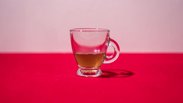 Cup Fills with Tea in Stop Motion