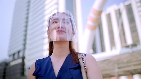 Office Girl in the city (Bangkok), wearing face shield