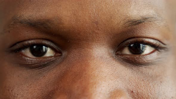 Closeup of a Black Man Whose Eyes are Looking Straight