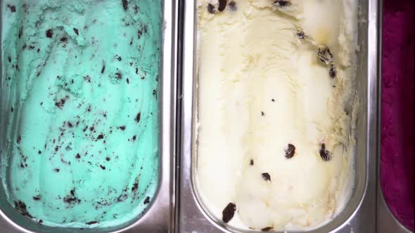 Closeup Shot of Different Flavors of Frozen Ice Cream Tray Partition in Ice Cream Shop