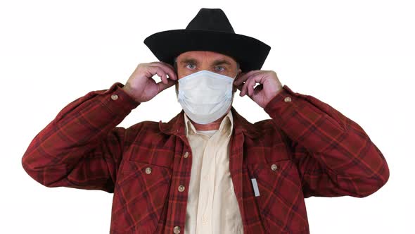 Farmer Taking Off Medical Mask and Taking a Deep Breath Coronovirus Pandemic Is Over on White