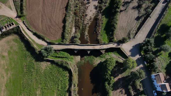 Top down view of the Idanha-a-Velha Roman Bridge from a drone