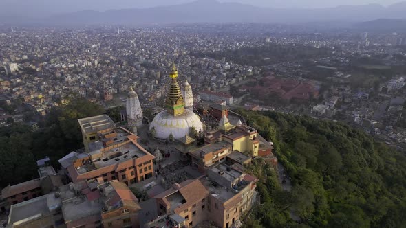 Circling around Swayambhunath Stupa viewing the city of Kathmandu