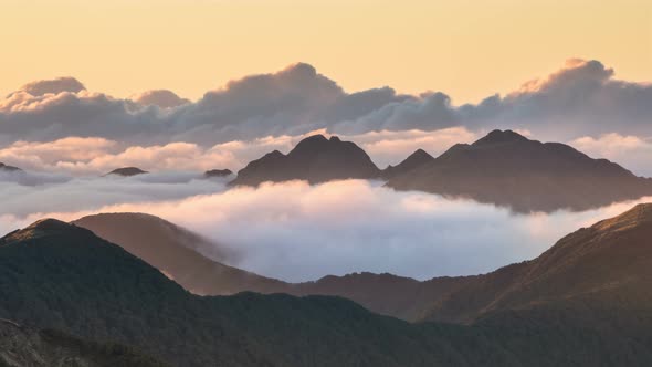 Epic Misty Clouds Moving over Alpine Mountains in Peaceful Evening Nature