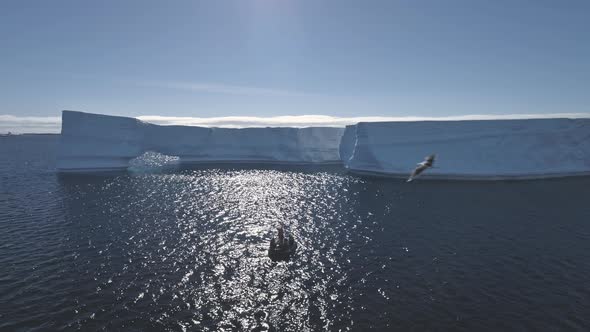 Tourist Boat Among Antarctica Ocean. Aerial Shot.