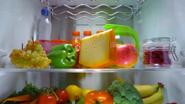 Open Refrigerator Filled with Food