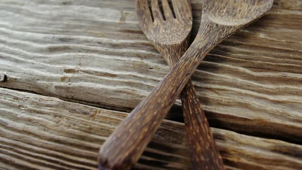 Wooden spoon and fork on table