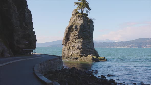 Seawall in Stanley Park and the Famous Siwash Rock