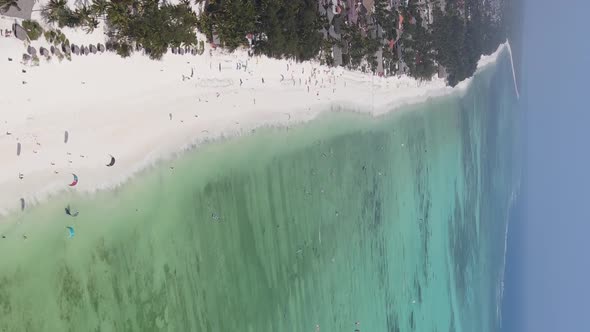 Vertical Video of the Ocean Near the Coast of Zanzibar Tanzania Aerial View