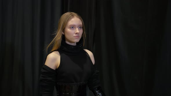 Light Brown Haired Girl Displays Catwalk on Fashion Show