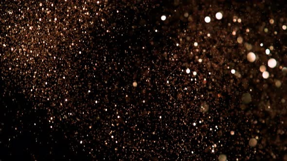 Golden Glitter Background in Super Slow Motion at 1000Fps