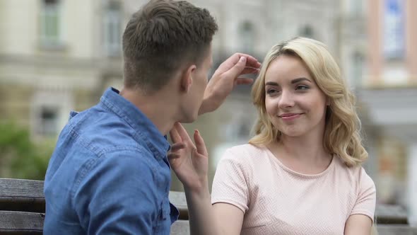 Beautiful Blond Girl Touching Boyfriend's Face, Enjoying Her Beloved, Love