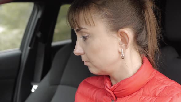 Woman Driver Sitting in the Car