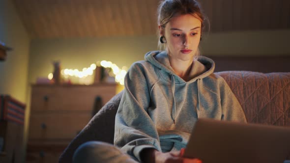 Meditative woman looking something on laptop