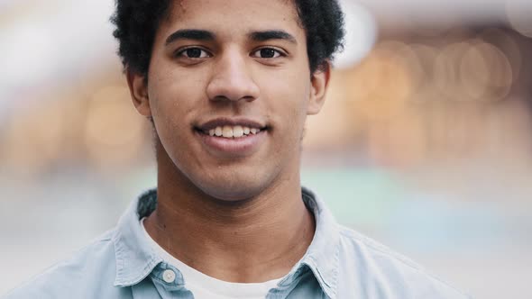 Male Face Closeup African Millennial American Man Guy Happy Looking at Camera Smiling Waving Nods